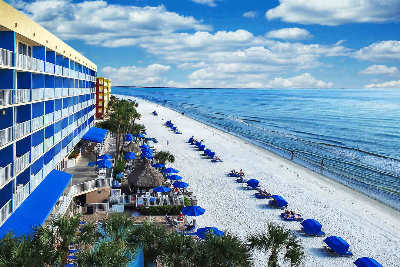 hotel beach with blue umbrellas